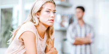 woman and man standing far apart