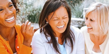 female friends laughing together