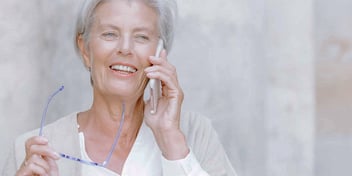 woman on the phone talking to a Hello Divorce team member