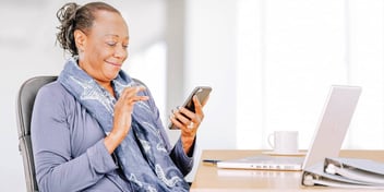 woman studying her phone