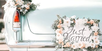 car with just married sign on back