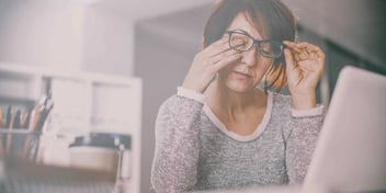 woman crying about her divorce and feeling mentally and physically unwell