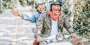 happy couple on bike