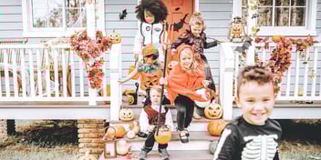 kids in halloween costumes having fun