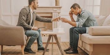 man talking to his therapist
