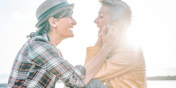 couple touching each other's faces