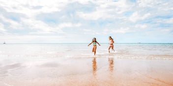 kids running on beach