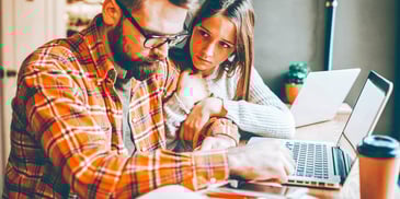 woman looking at man to assess how he is feeling