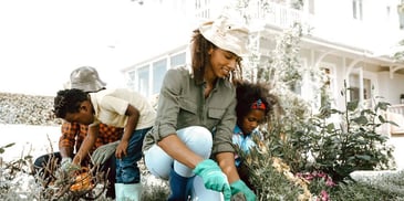 mother and children gardening