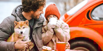 dad and daughter and pet fox outdoors