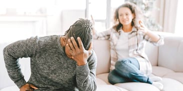 upset couple trying to have a difficult conversation
