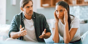 woman looks annoyed by man 