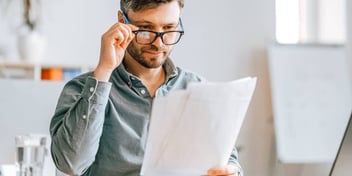 Man reviewing papers
