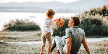 dad and son together outside