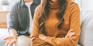married couple with tense posture