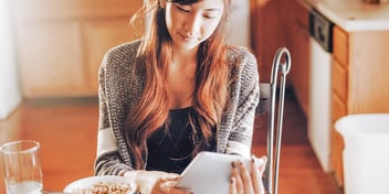 woman looking at todo list