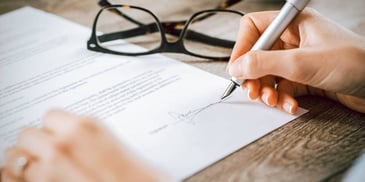 signing divorce paper 
