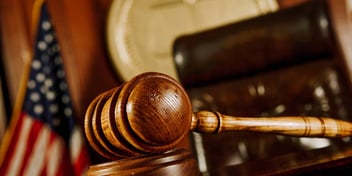 gavel on desk in American courtroom