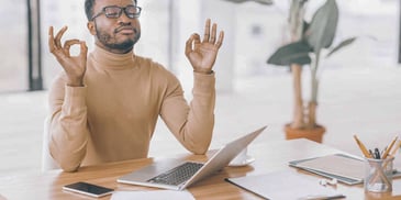 man with laptop who is super happy he found Hello Divorce online 