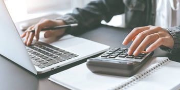 person making calculations