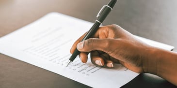 person using a checklist to plan