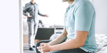 Couple arguing over divorce in the bedroom