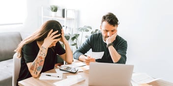 couple agonizing over their finances