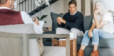 Couple meets with a mediator during their divorce process