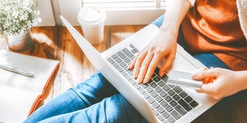 person paying bills online
