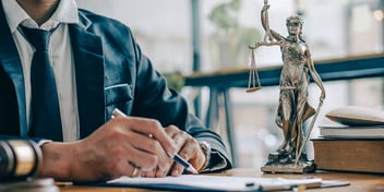 A divorce lawyer prepares to meet with his client