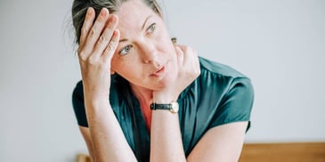 exhausted and upset woman considers her options