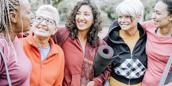 Group of women gather after yoga