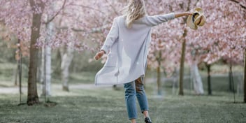 happy woman taking a walk and feeling thankful she got a divorce