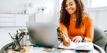 smiling woman happy to be planning her life after divorce