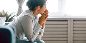 Indian woman sitting alone in deep thought
