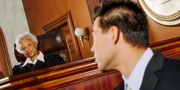judge considering holding man in contempt