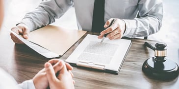 judge signing a divorce decree