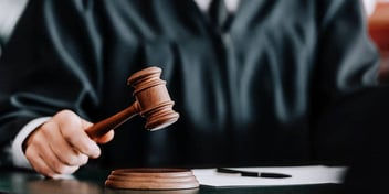 divorce court judge with gavel giving a ruling