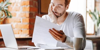man looking over a spousal support document