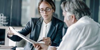 man meeting with a CDFA to go over his finances during divorce