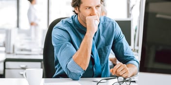serious looking man at work