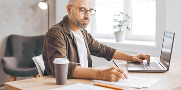man working on his post-divorce budget