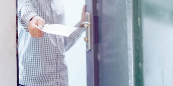 men serving someone with divorce papers