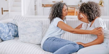 mom comforting daughter during a hard conversation