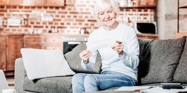 woman receives a check for her share of her ex spouse's social security benefits