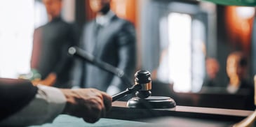 judge uses their gavel to conclude a session in divorce court