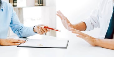 person refusing to sign a document
