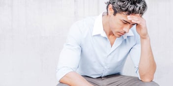 sad man contemplates his life after divorce