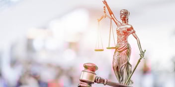 Scales of justice in a courtroom