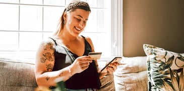 smiling woman taking charge of her finances